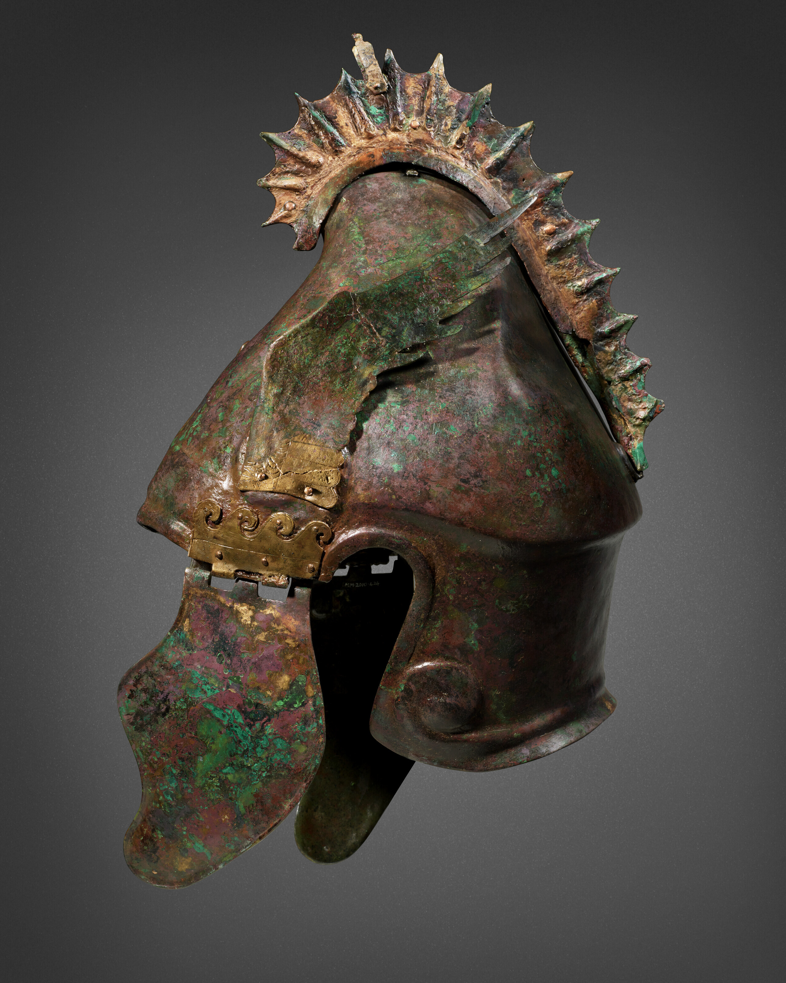 A GREEK BRONZE CHALCIDIAN HELMET, MAGNA GRAECIA, HELLENISTIC PERIOD, CIRCA  300-200 B.C. | Christie's