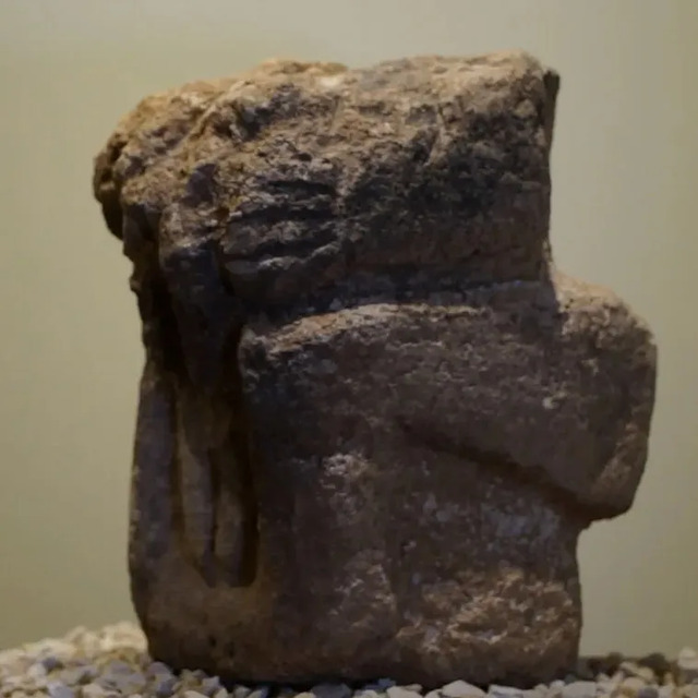 A human-like stone statue discovered at Göbeklitepe, showcasing early attempts at anthropomorphic representation.