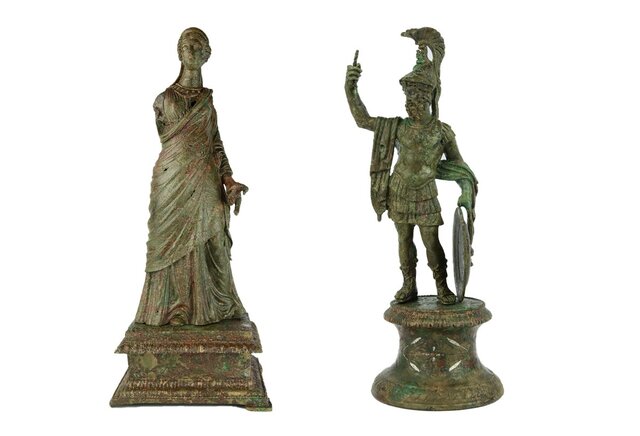 Two bronze statuettes from the Roman domus in Reims, depicting Mars, the Roman god of war, and a mysterious female figure adorned with a sphinx-topped helmet. Credit: Jean-Jacques Bigot, Inrap.