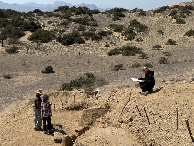 In a stunning discovery, archaeologists work to expose sections of a 4,000-year-old ceremonial temple hidden in a sand dune in Lambayeque, Peru, as captured in this image shared by Reuters on July 5, 2024. (Credit: Peru's Pontifical Catholic University/Handout via REUTERS)