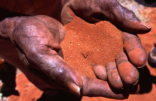 A close-up of ochre reveals its deep connection to cultural and ceremonial practices, continuing the legacy of the Wurundjeri Woi-wurrung people. 