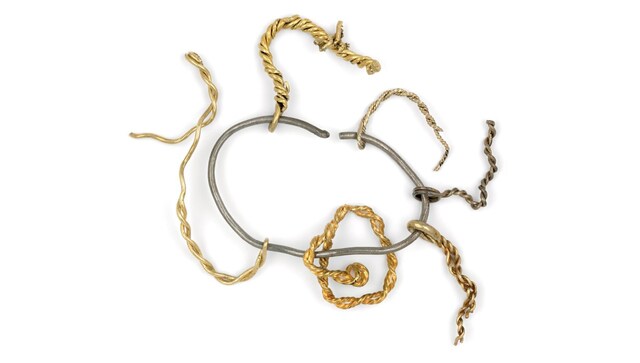 In Hoard F, fragments of multiple torcs were threaded together on a large ring.