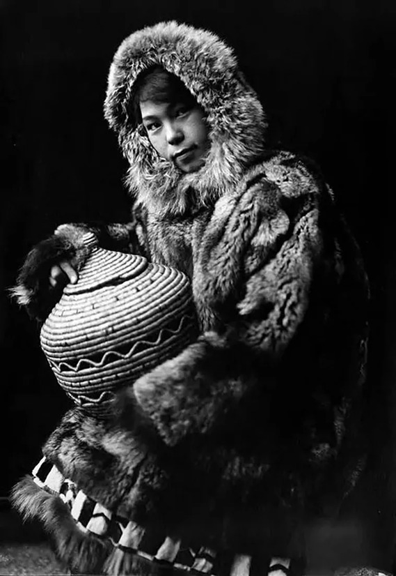 A King Island Inuit basket maker at work, captured in Alaska between 1915 and 1925.