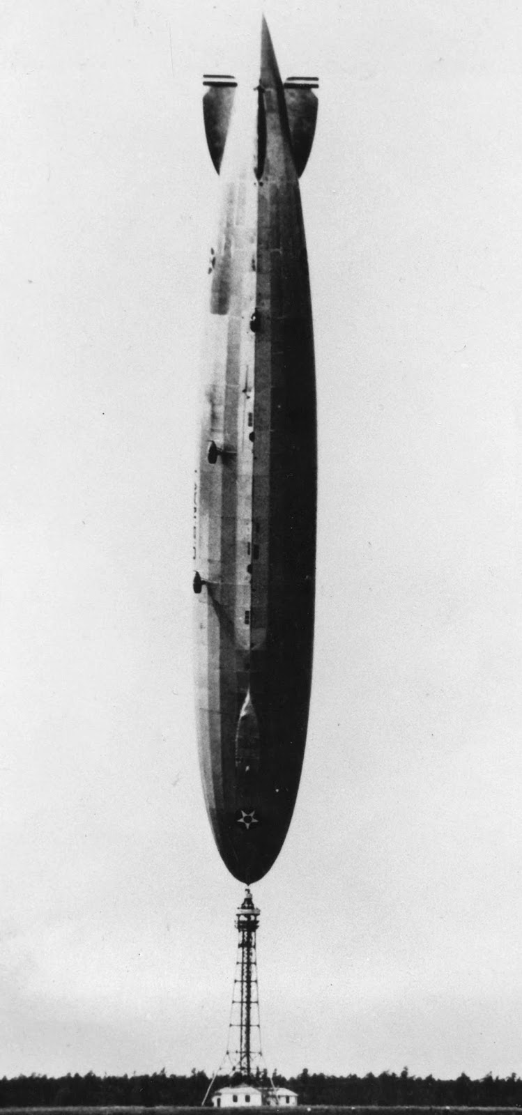 A powerful wind from the Atlantic flips the 700-foot U.S. Navy dirigible Los Angeles onto its nose at Lakehurst, New Jersey, in 1926. The ship eventually righted itself, with all 25 crew members unharmed.