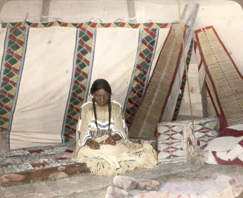 A Siksika woman in Montana, her expression capturing the spirit of her people. Early 1900s.