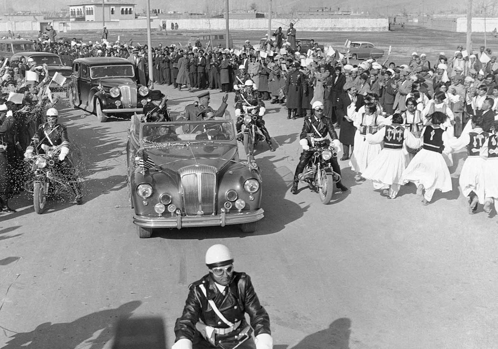 A lively performance in Kabul, as dancers take to the streets on the day of President Eisenhower’s visit, December 9, 1959.