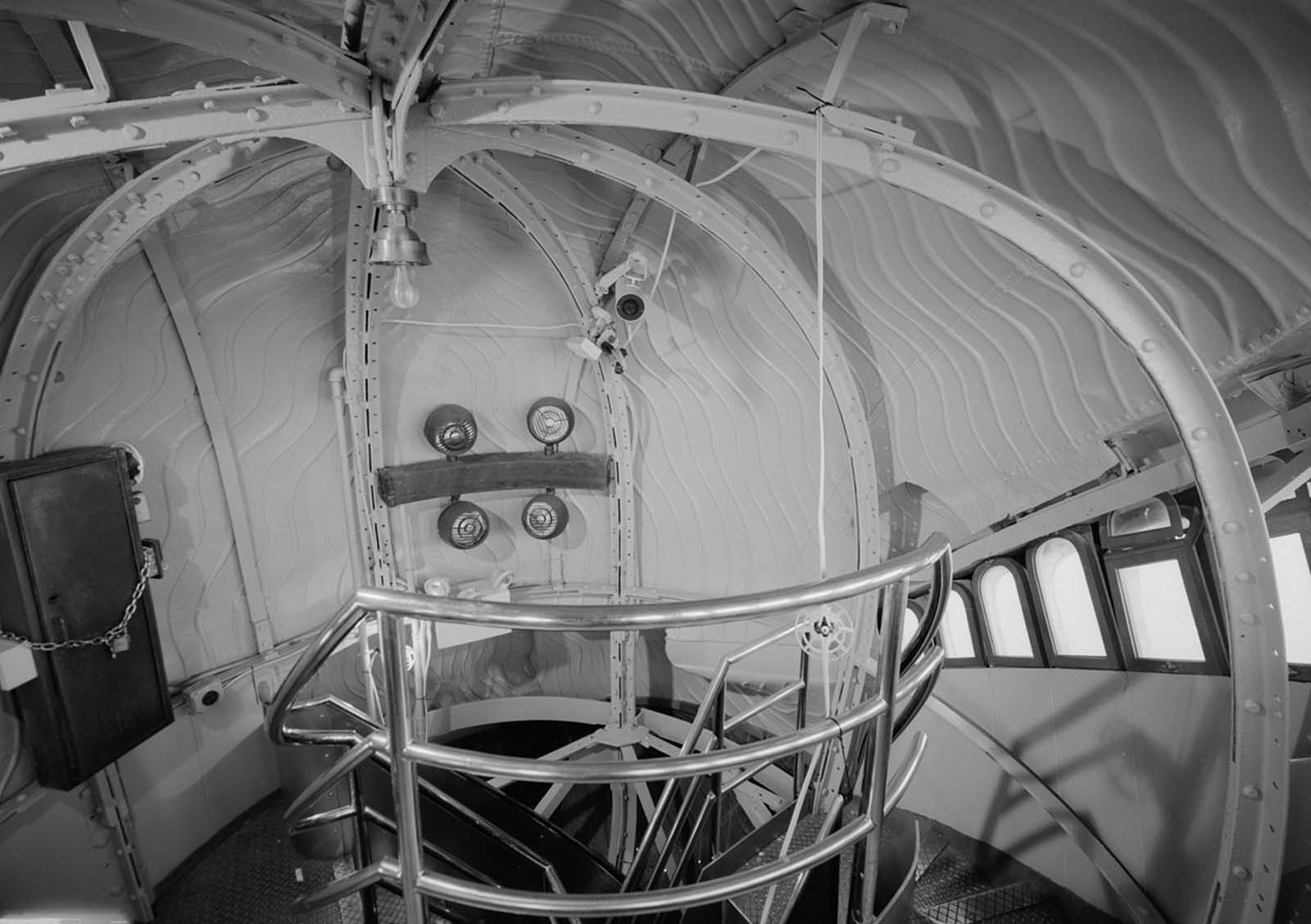 A look inside Lady Liberty’s head and crown, revealing the intricate ironwork that supports her massive structure.