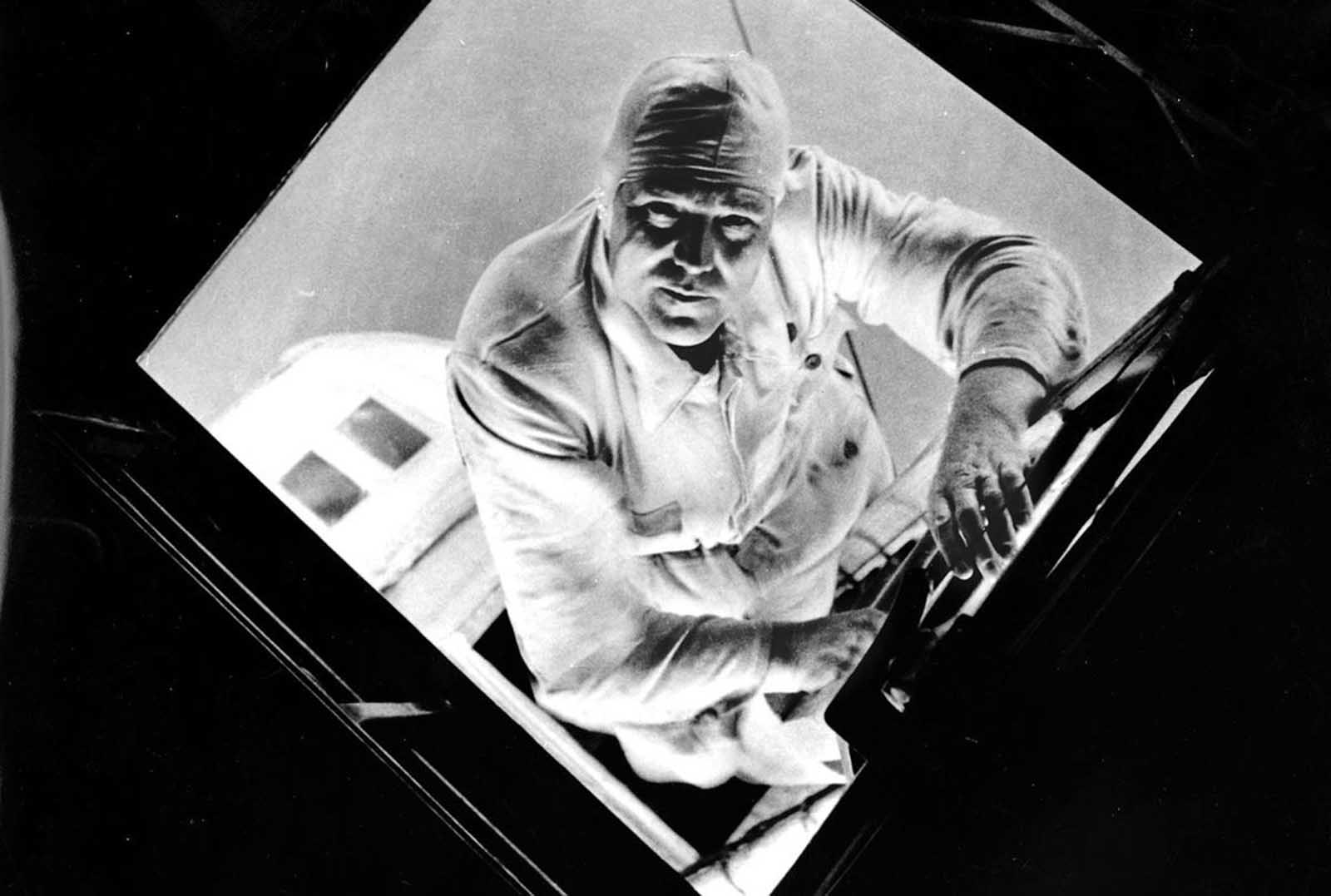 A mechanic aboard the Graf Zeppelin moves through the airship’s interior during a transatlantic voyage from Europe to South America in August 1933