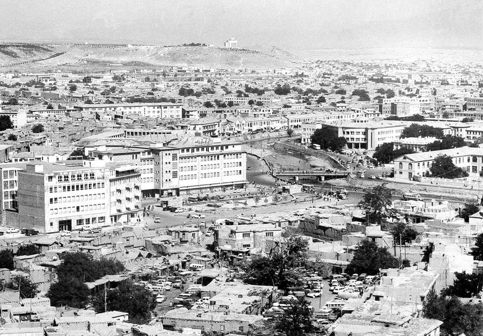 A panoramic view of Kabul in August 1969, featuring both old and new structures and the Kabul River winding through the city.