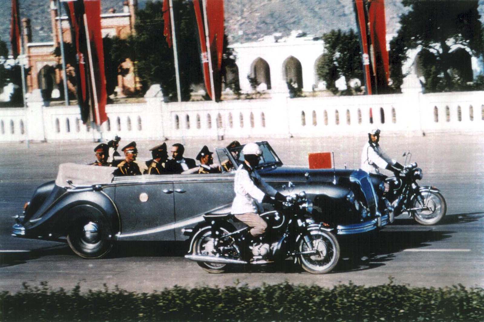 A regal moment in Kabul, as King Mohammad Zahir Shah is chauffeured down Idga Wat in 1968.