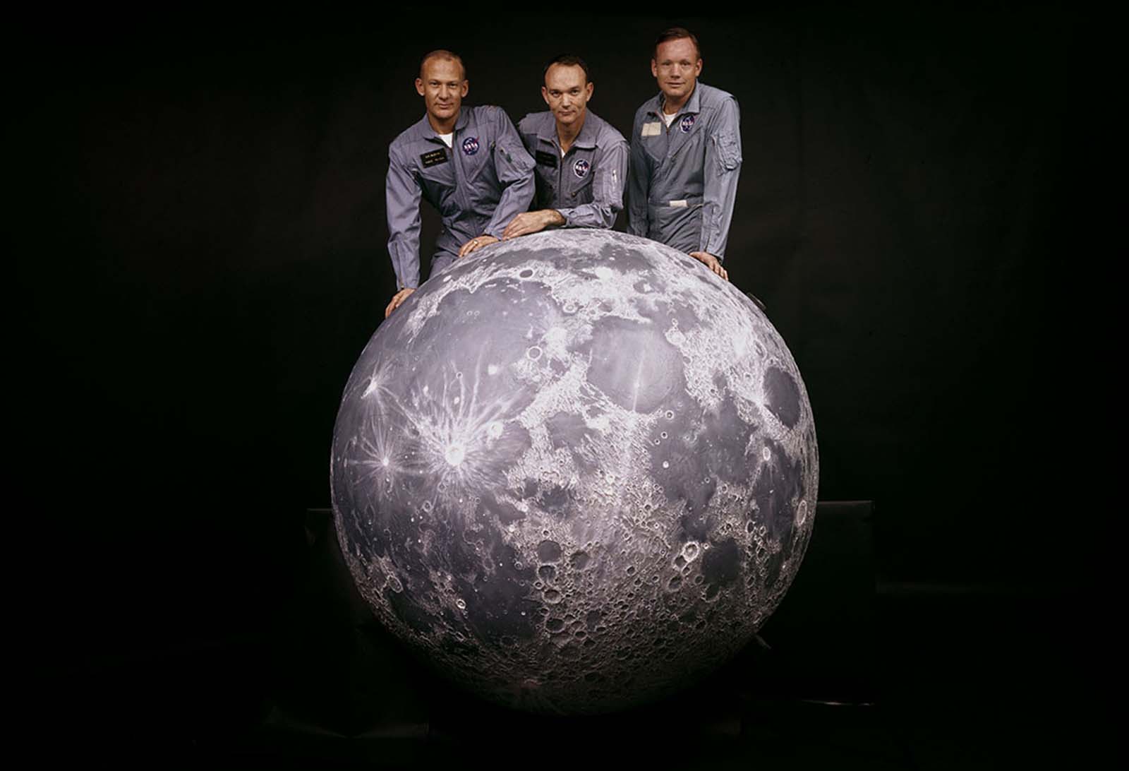 A timeless portrait of NASA’s Apollo 11 crew—Buzz Aldrin, Michael Collins, and Neil Armstrong—standing on the edge of history in the spring of 1969.