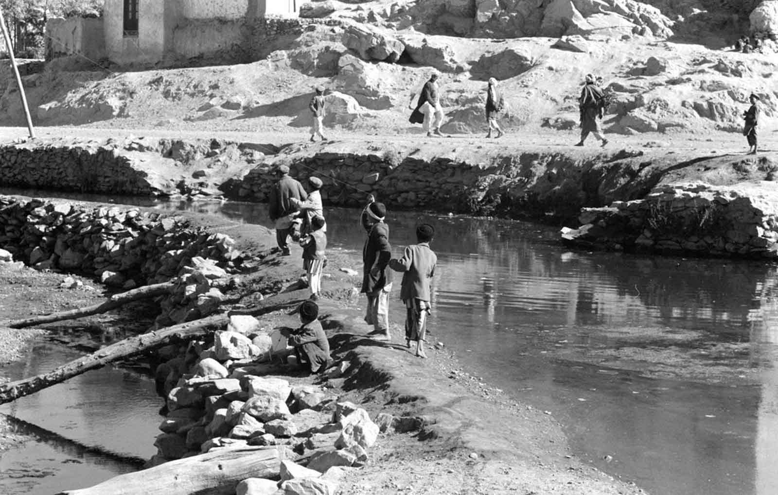 Afghan boys flying kites, a timeless pastime, captured in November 1959.