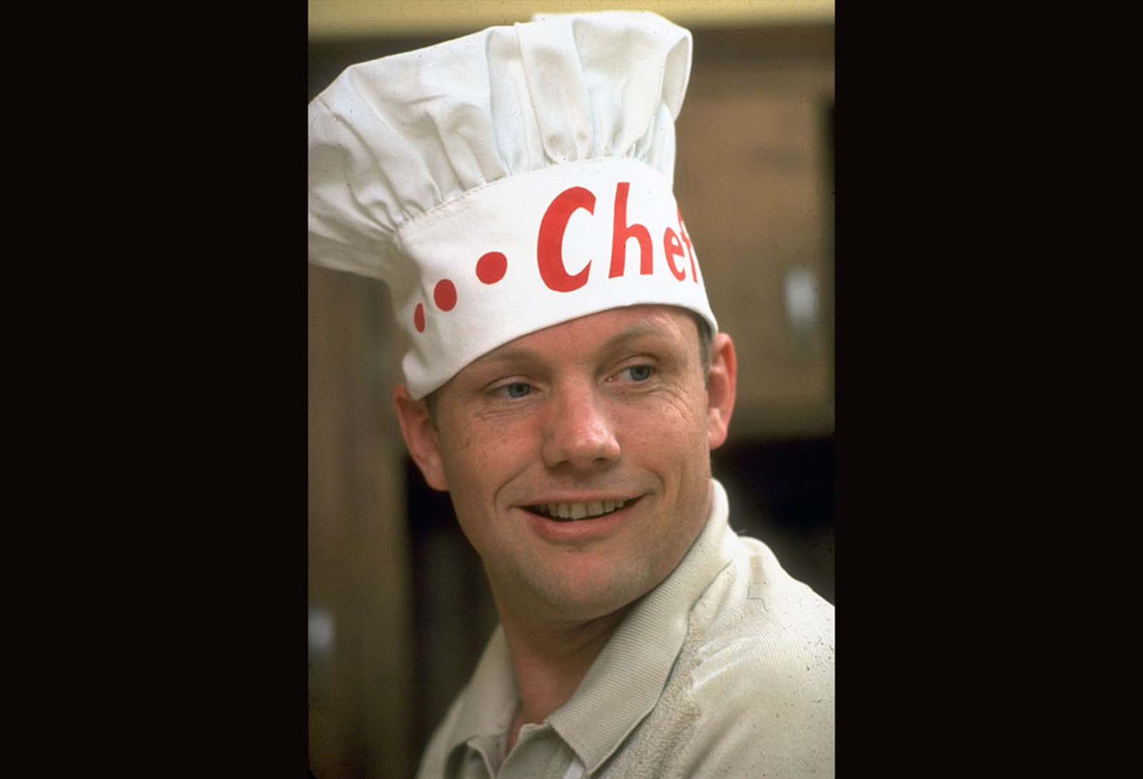 Chef Neil Armstrong, flipping pancakes in his kitchen, March 1969—a lighthearted moment before his historic journey.