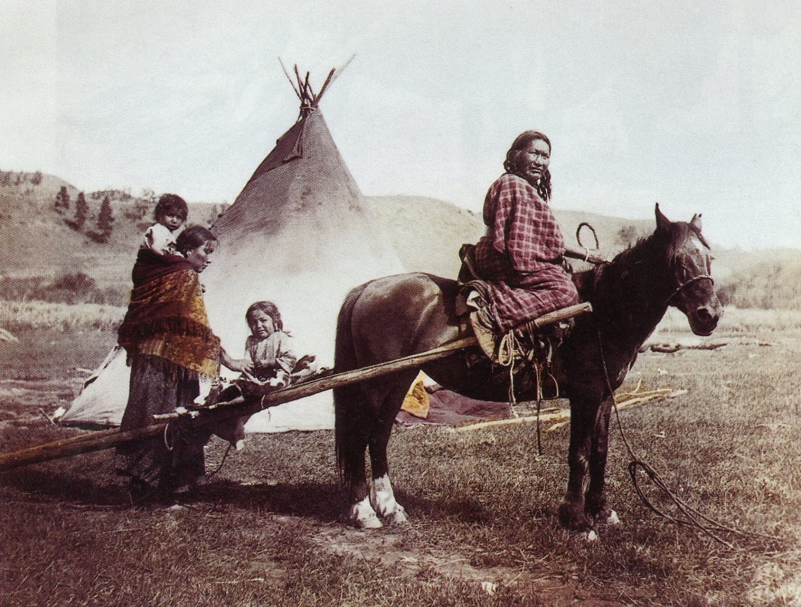 Chief Little Wound and his family, members of the Oglala Lakota, in a rare family portrait. 1899. Photo by Heyn Photo.