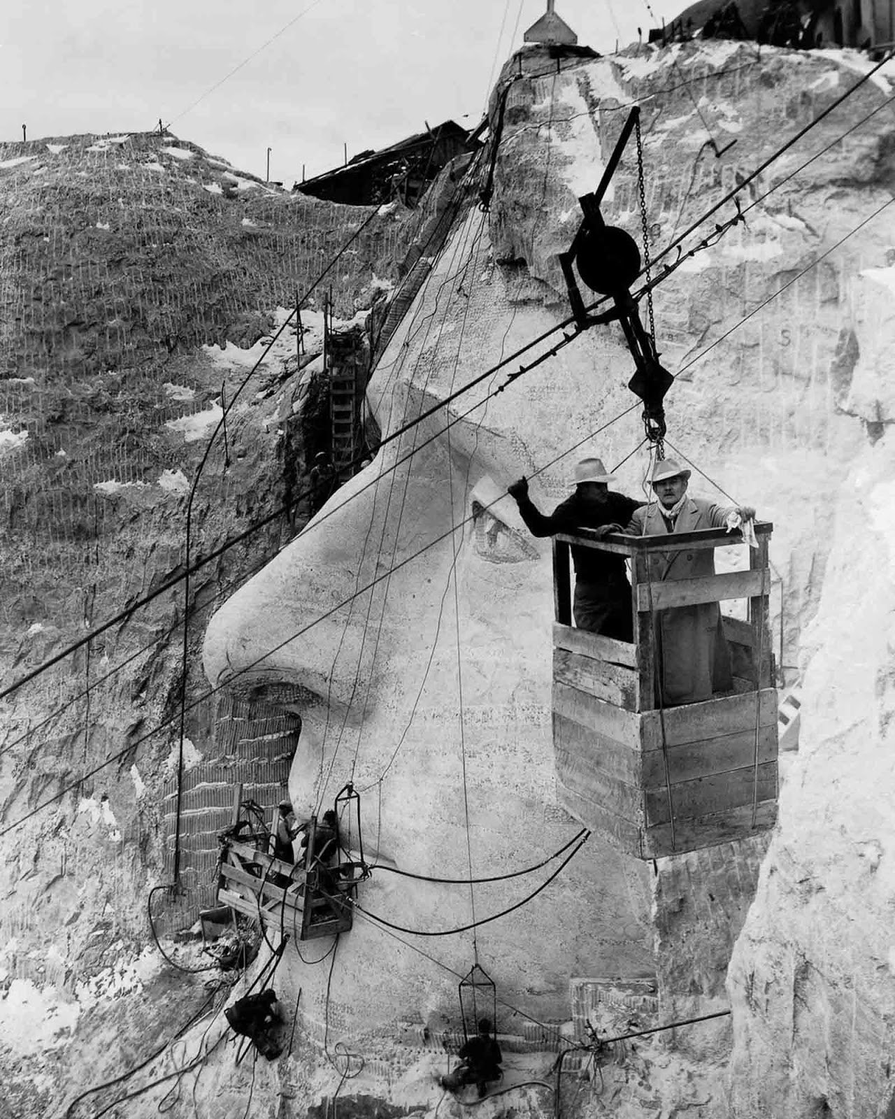 Gutzon Borglum and his son Lincoln oversee progress on Thomas Jefferson’s head, 1935.