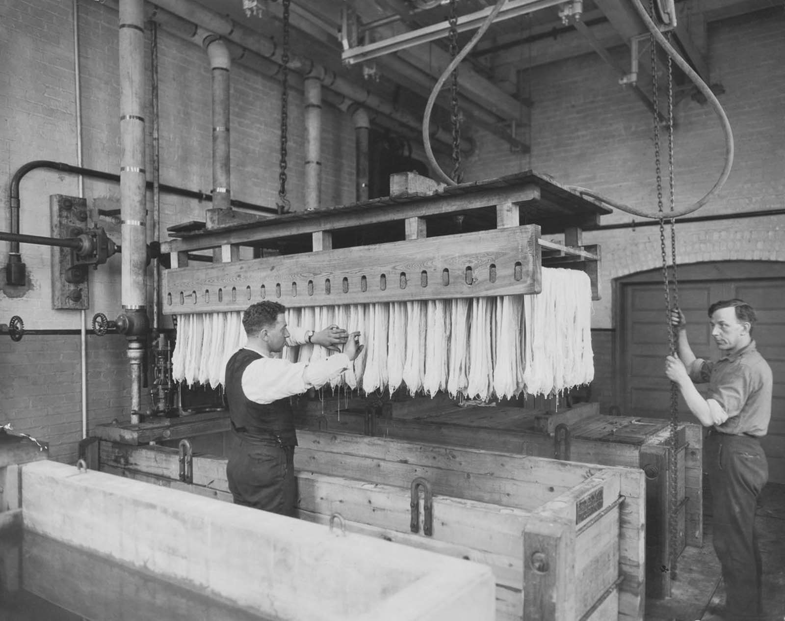 Inside a bustling pasta factory, workers shape and dry Italy’s most beloved staple. Date unknown.