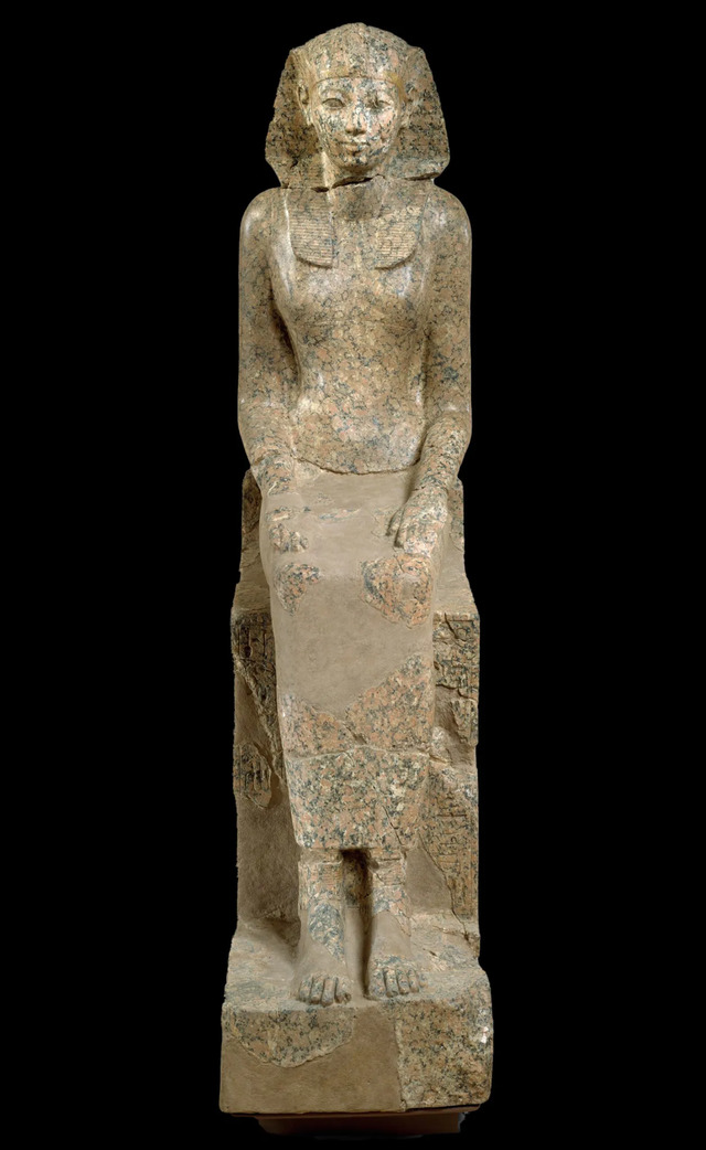 One of the most iconic representations of Hatshepsut is a granite statue, which shows her seated, wearing the nemes headdress, a symbol reserved for the reigning king