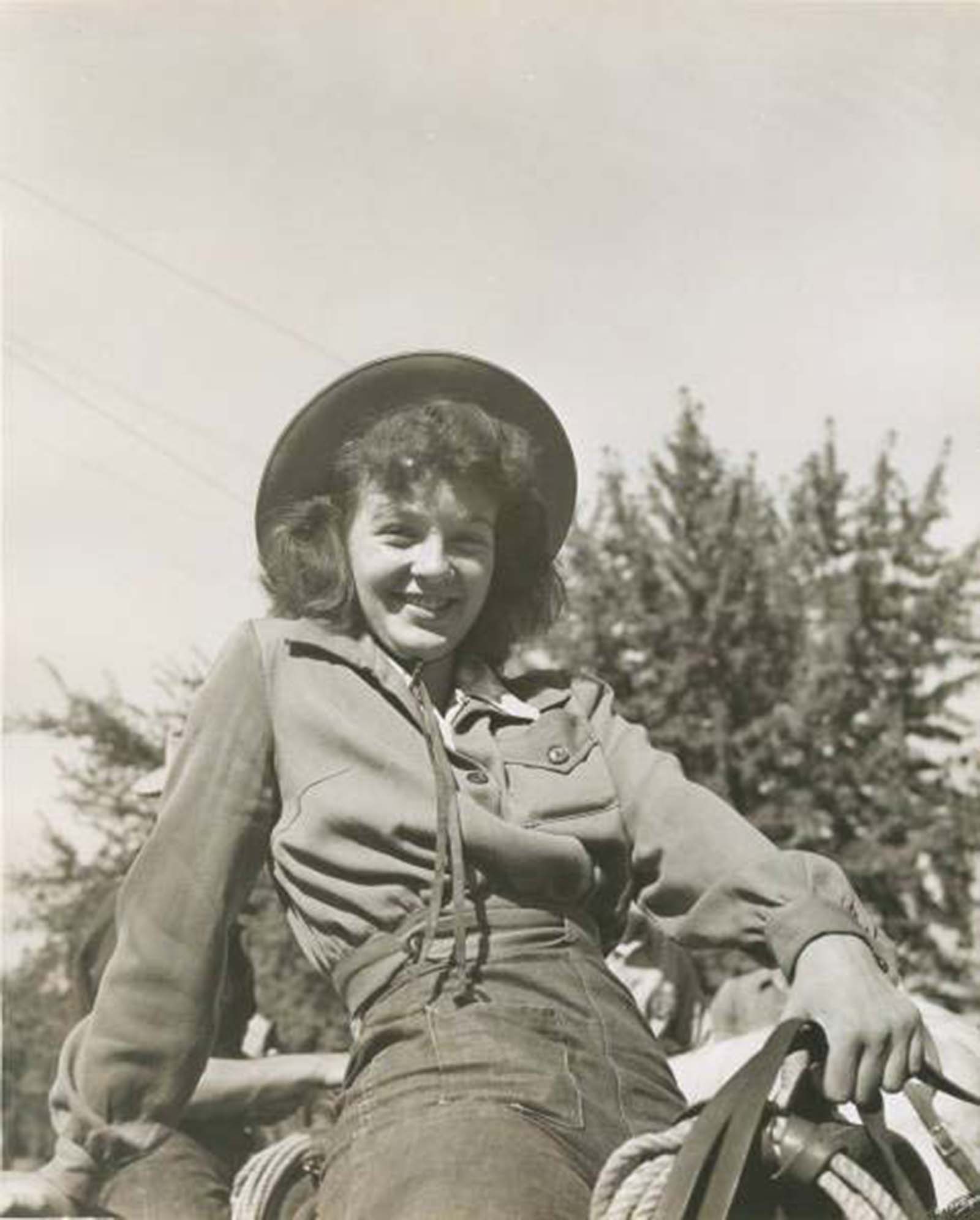 Pendleton Rodeo Star – A fearless cowgirl showcasing her riding skills at Oregon’s famous rodeo.