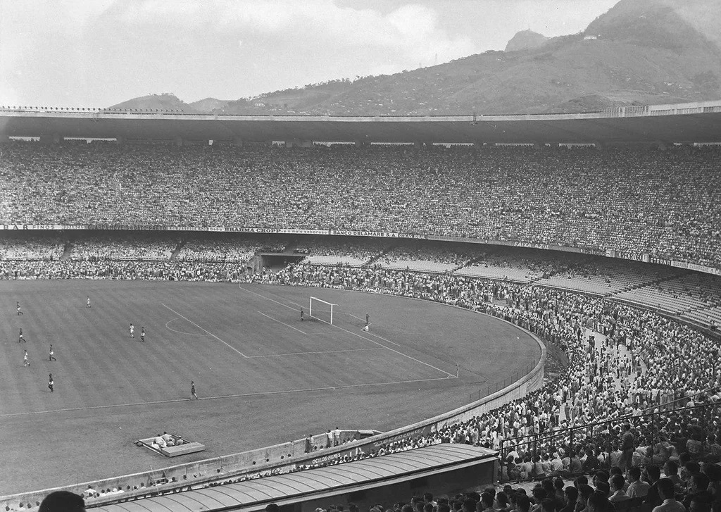 The legendary 1950 FIFA World Cup Final—Brazil vs. Uruguay at the Maracanã Stadium. With an official attendance of 173,850 and an estimated crowd of over 200,000, it remains the most attended football match in history.