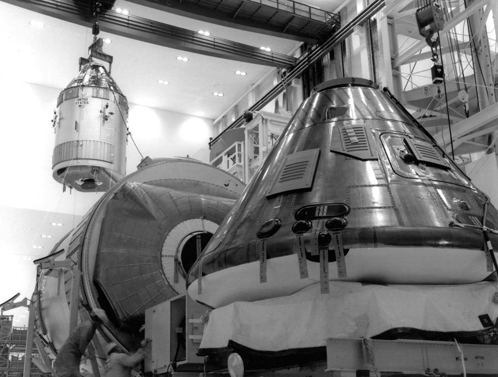 The Apollo 11 command and service modules are carefully moved into position on April 1, 1969, bringing NASA one step closer to the moon.
