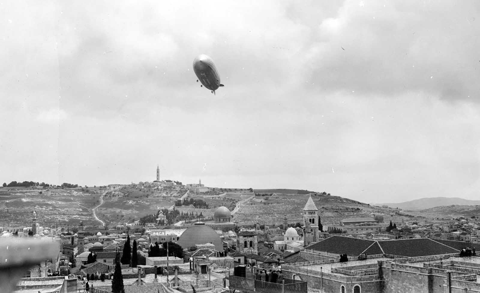 The Graf Zeppelin soars above Jerusalem on April 26, 1931, during one of its many long-distance flights.