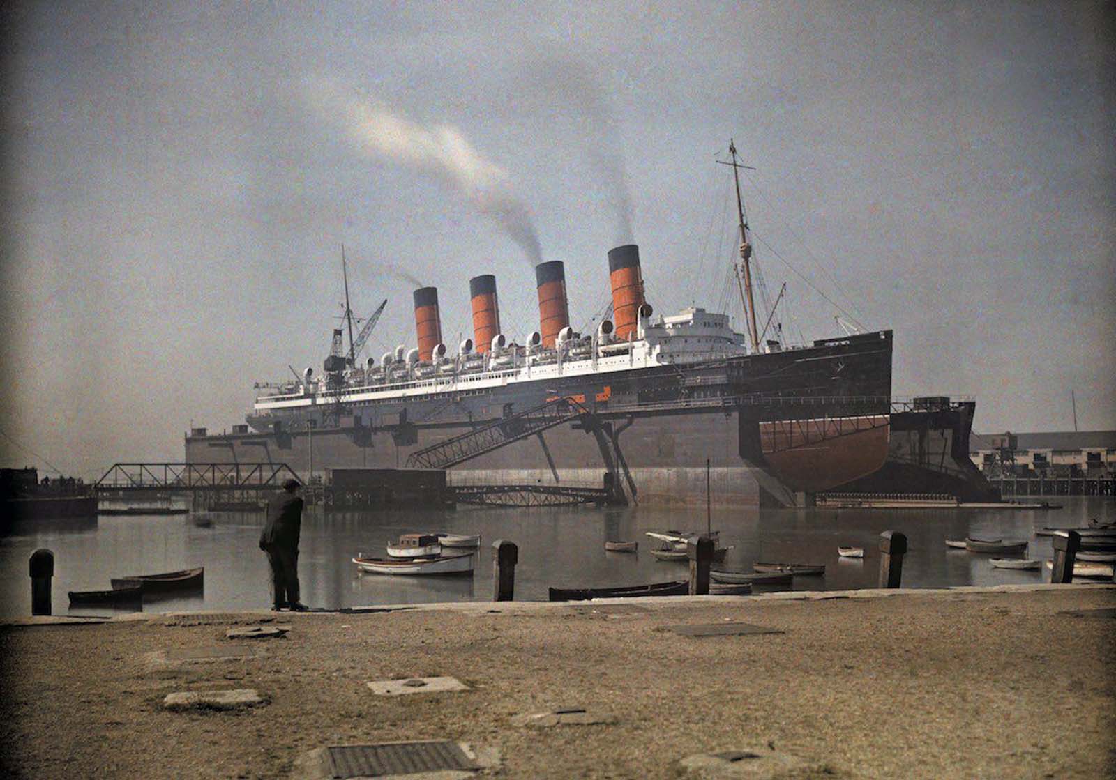 The Grandeur of the Mauretania – The iconic Cunard ocean liner, SS Mauretania, rests majestically at dock in Southampton, Hampshire.