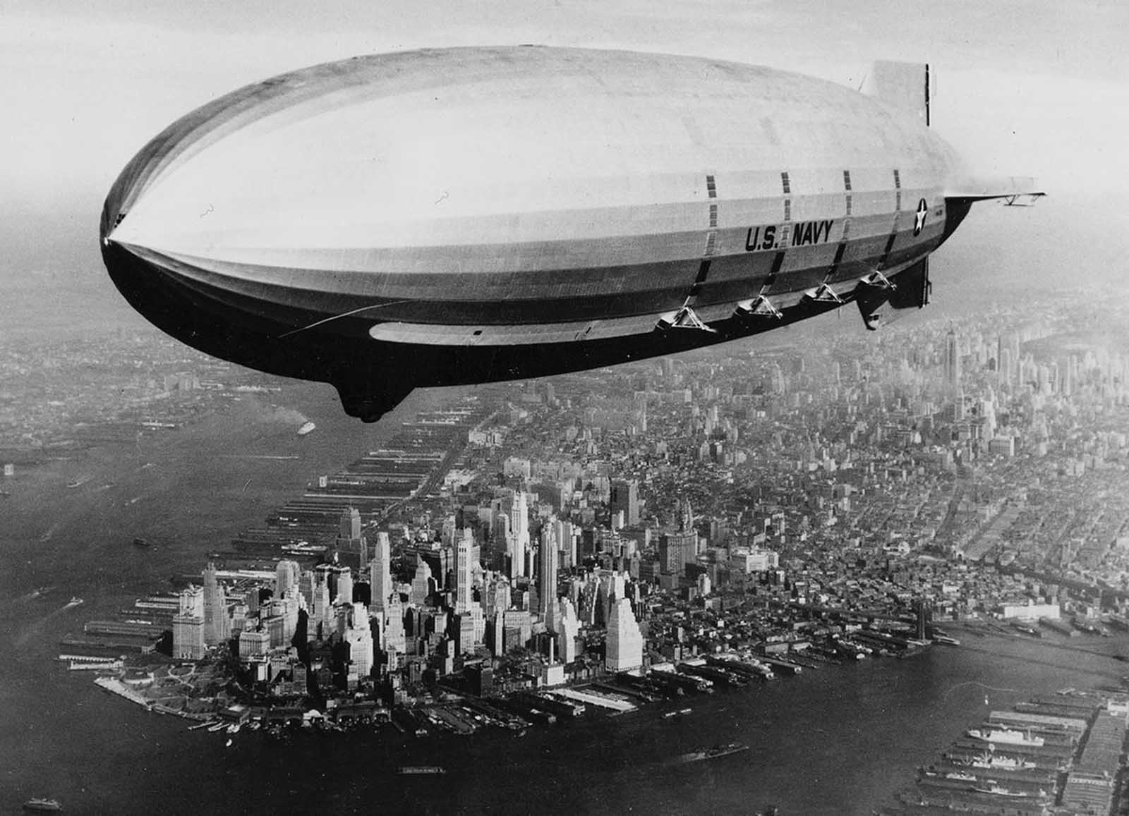 The USS Macon drifts over lower Manhattan on October 9, 1933, offering an awe-inspiring sight.