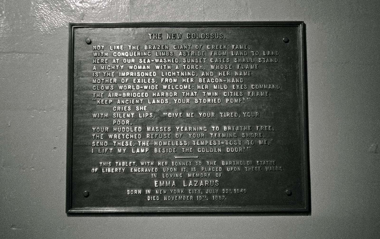The iconic poem “The New Colossus” by Emma Lazarus, inscribed on the statue’s pedestal. Originally written in 1883 to help fund its base, the sonnet was cast in bronze and mounted in 1903.