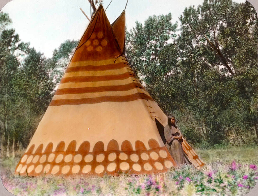 Thunder Tipi of Brings-Down-The-Sun, a sacred Blackfoot camp, photographed in the early 1900s. Glass lantern slide by Walter McClintock.