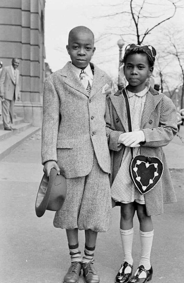 A charming photo of a brother and sister from Chicago, 1945. Their fashion, especially her purse, is adorable!