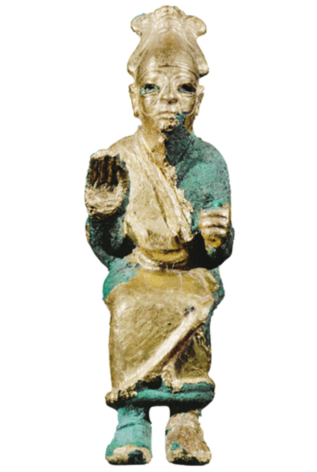A stunning gold-covered bronze statue of a deity was discovered in Ugarit, highlighting the city's artistic craftsmanship. (Scala/Art Resource, NY)
