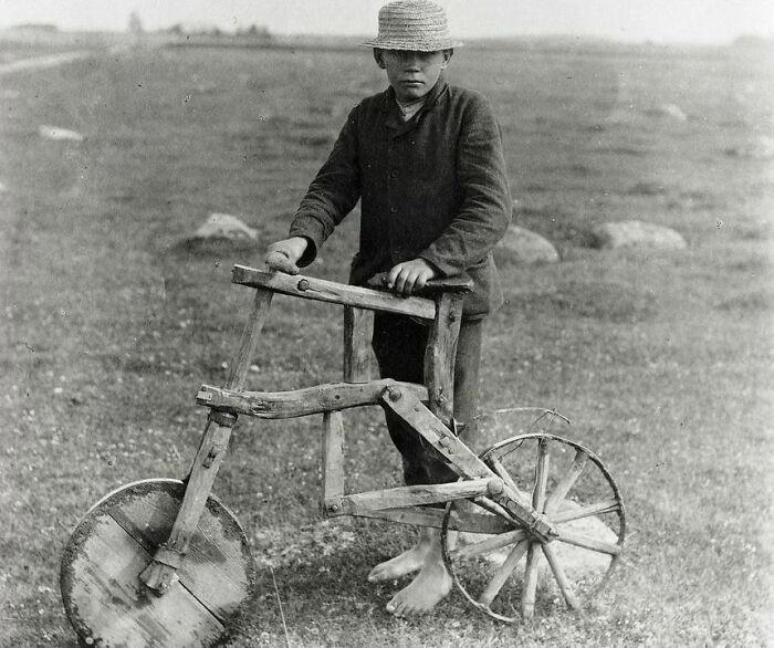 An Estonian cyclist proudly riding his self-made bicycle, 1912.