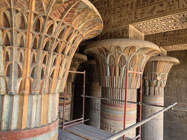 During restoration of the entrance hall, conservators uncovered the original vibrant colors on the column shafts and lotus-leaf capitals, as well as hieroglyphic inscriptions that had been hidden on the crossbeams and walls.