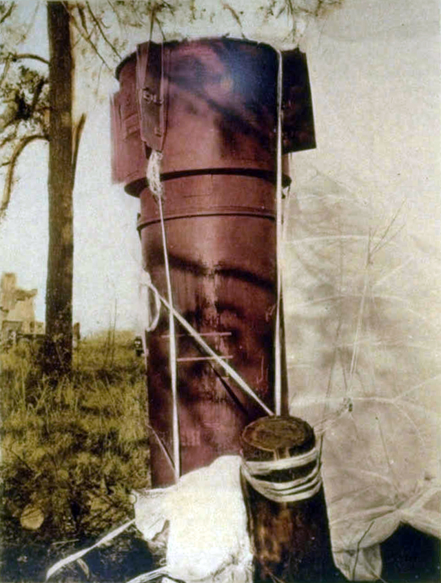 One of the Mk 39 bombs from the Goldsboro incident, almost completely intact with its parachute still deployed.