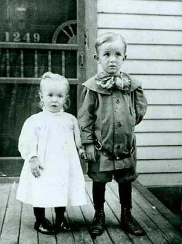Ruth Disney stands with her older brother Walt in 1906.