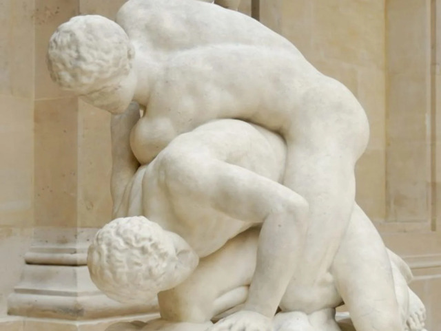 Sculpture of ancient Greek wrestlers – A marble sculpture illustrating the intense struggle between two wrestlers, reminiscent of Milo's wrestling feats.